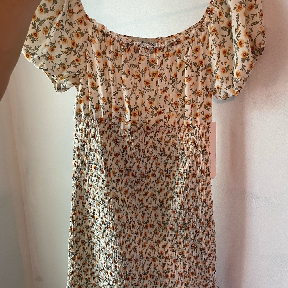 Off the shoulder mini flower dress.